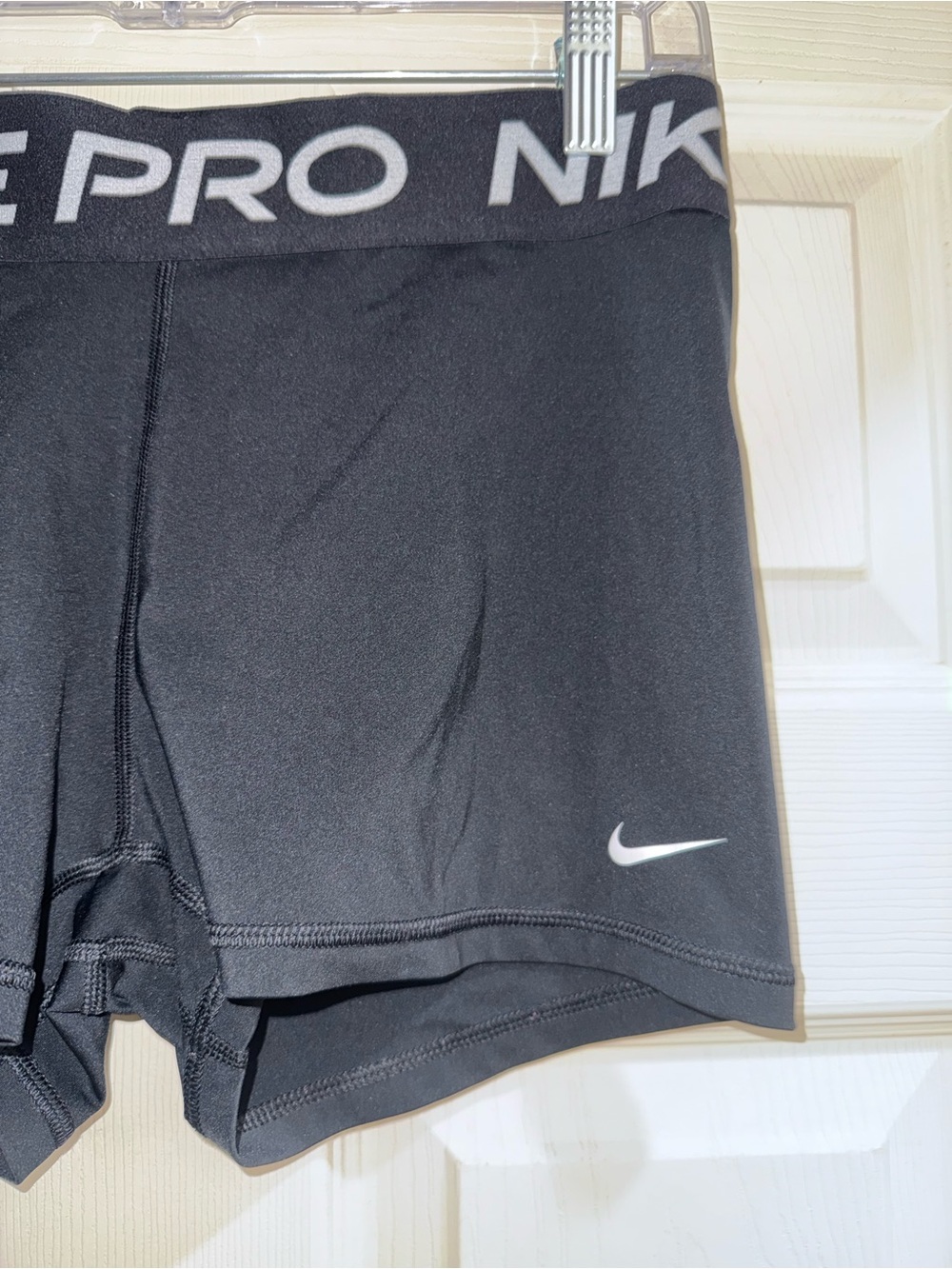 Nike Black Athletic Compression Shorts with White Swoosh